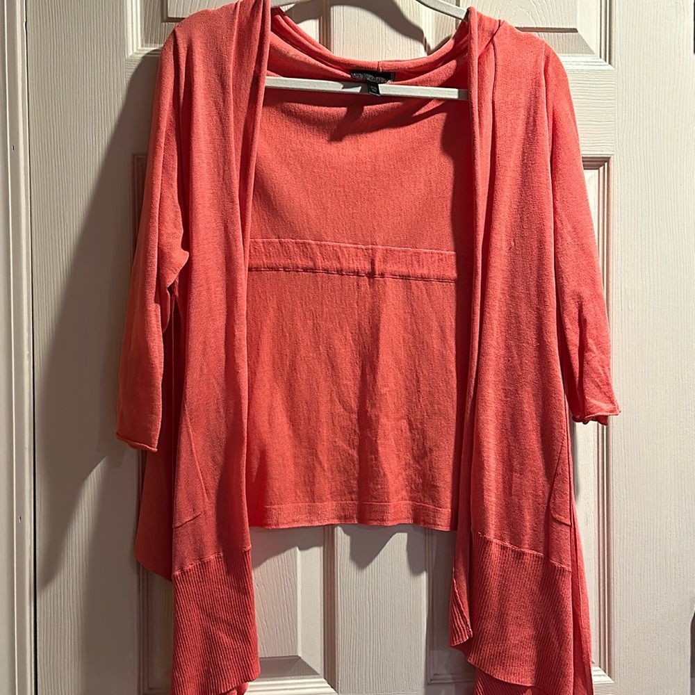 Melon color lightweight knit sweater with cascading sides